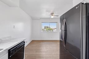 Kitchen with refrigerator at Ocean Villas Apartments, Oxnard, 93033