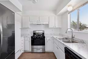 Kitchen with stainless steel appliances at Ocean Villas Apartments, Oxnard, CA, 93033