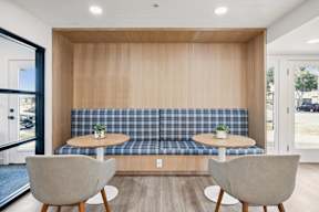 Table with Chairs at Ocean Villas Apartments, California