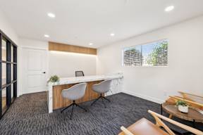 Leasing office with desk and chairs at Ocean Villas Apartments, California, 93033