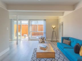 Living Room With Balcony at The Preston at Hillsdale, San Mateo, California