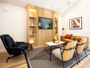 a living room with a couch and a television at Parc Medallion LLC, California, 94587