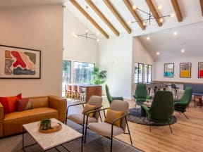 a living room filled with furniture and a table with chairs at Parc Medallion LLC, Union City, CA 94587