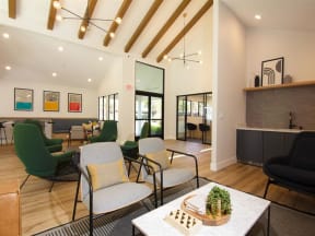 a living room with chairs and a table at Parc Medallion LLC, Union City, CA