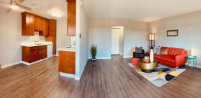 a living room with a couch and a kitchen at Element LLC, Sunnyvale, CA, 94086