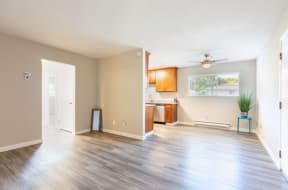 an empty living room and kitchen with a wood floor at Element LLC, Sunnyvale, CA, 94086