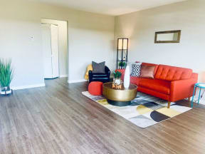 a living room with a couch and a table in it at Element LLC, Sunnyvale