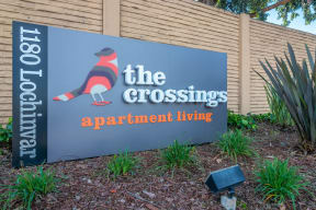 a sign for the crossroads apartments at the entrance to the building at Sunnyvale Crossings Apartments, LLC, Sunnyvale, CA