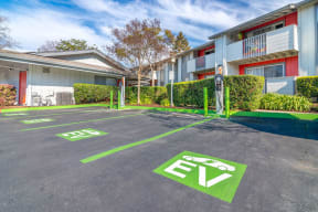 a parking lot in front of an apartment building at Sunnyvale Crossings Apartments, LLC, California