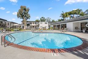 A swimming pool with a no swimming sign on the ground at Latitude Apartments at Mission Valley Apartments, California, 92120
