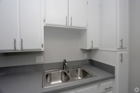 Sink With Faucet at The Marq Apartments LLC, Los Angeles