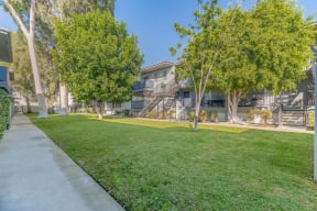 apartment community with grass and trees at BLVD Apartments LLC, Tarzana, CA 91356