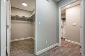 a renovated basement with a closet and a door open to a bathroom at Citra Apartments LLC, San Diego, CA, 92107