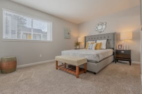 a bedroom with a bed and a window at Napa Green Apartments LLC, Napa