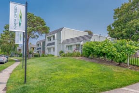 a house with a yard and a sign in front of it at Napa Green Apartments LLC, Napa