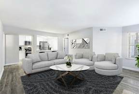 A modern living room with a grey sofa set and a coffee table.