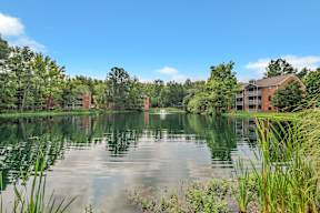 the view of the lake at the flats at walnut creek apartments