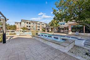 Sunny Swimming Pool Area at Platinum Castle Hills, Lewisville, TX