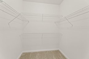 Empty white closet at Legacy Flats Apartments, Texas