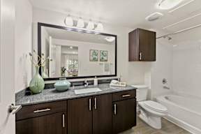 Primary Bathroom at Legacy Flats Apartments, San Antonio, TX