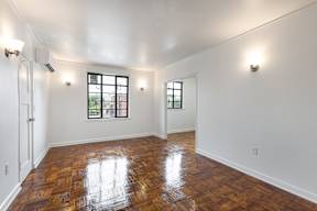 Living room with wooden floor at Marleigh apartments located in Indianapolis, IN