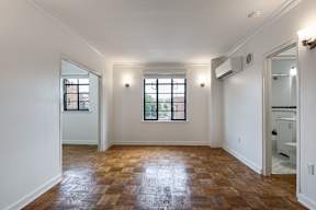 Newly renovated with wooden floors and large windows  at Marleigh apartments located in Indianapolis, IN