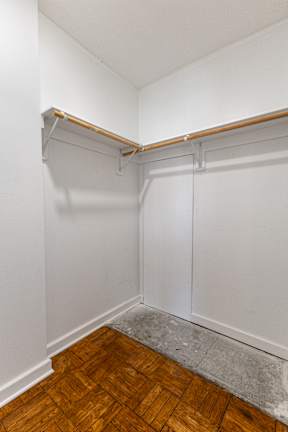 Spacious closets with wooden shelves  at Marleigh apartments located in Indianapolis, IN