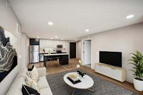 Harbourline Apartments, St Paul a living room with a couch and a table
