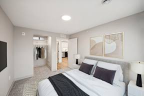Harbourline Apartments, St Paul a bedroom with a bed and a closet