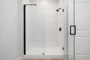Walk-In Showers With Built-In Bench And Glass Enclosure at Crossline, Columbus, OH, 43201