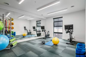 a gym with weights and cardio equipment  at Crossline, Columbus, OH, 43201