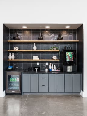 a home bar with gray cabinets and a black wall at Crossline, Ohio, 43201