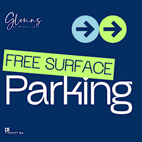 A sign advertising free surface parking at Glenn's of Millers Lore.