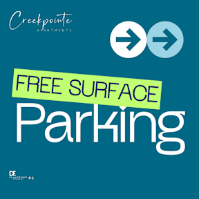 A sign advertising free surface parking at Creekpointe Apartments.