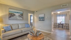 a living room with a couch and a coffee table