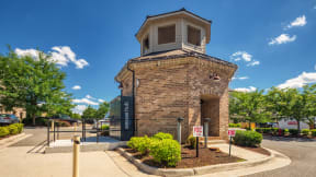 an old brick building with a clock tower on top of it