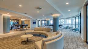 Modern Living Room at Evening at Mosaic Summit Pointe VA, 23320