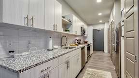 Kitchen at Evening at Mosaic Summit Pointe VA, 23320