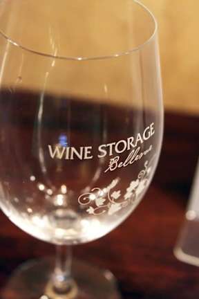 A wine glass with the words "Wine Storage" written on it.