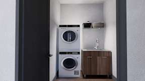 Modern laundry room with a washer and dryer at Damask, Windsor, N8S 3N4