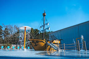 A pirate ship water slide at a water park.