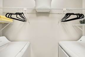 A laundry room with a washer and dryer.