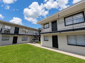 Clean walkways and balcony located at the pointe apartments in Pasadena, Tx