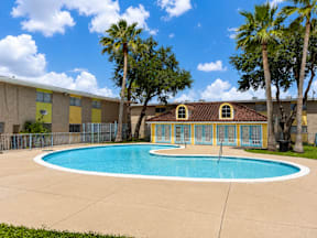 Large swimming pool located at the pointe apartments in Pasadena, Tx