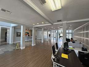 A spacious office with wood floors located at Canfield Lakes Apartments in Houston TX