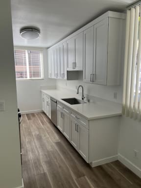 Kitchen with Stainless Steel Appliances and White Cabinets