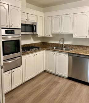 Kitchen with White Cabinets and Hard Floor