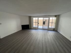 Living Room with Hardwood Floors, Fireplace and Patio Doors