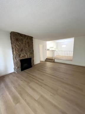 Living Room with Hardwood Floors and Fireplace