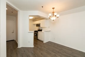 Dining Room with Chandelier and Hardwood Floors